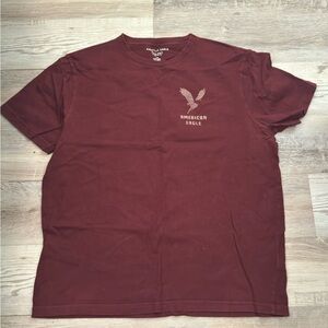 American Eagle Men's Super Soft Graphic T-Shirt in burgundy with a lived-in logo